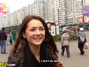 Young and cute russian brunette is giving blowjob to her bf